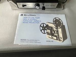 lot 47 image: VTG Bell and Howell Super 8 Movie Projector with Screen