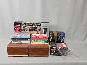 lot 78 image: Various VHS Tapes Inc Star Wars Orig Trilogy, Die Hard Trilogy, Lethal Weapon 1 & VHS Wooden Storage Container