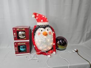 lot 87 image: Two Boxes of LED Lighted Mercury Ornaments & Christmas Light Up Penguin (2 tall)