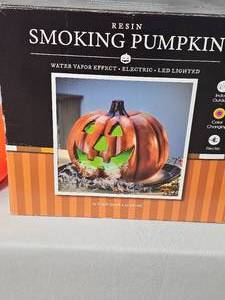 lot 98 image: LED Light Up Smoking Jack-0-Lantern in Orig Pkg, Halloween Pumpkin w Handle