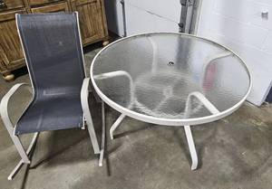 lot 16 image: Outdoor Glass Top Patio Table w Outdoor Rocking Chair