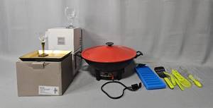 lot 154 image: Wok w Power Cord, Ice Cube Tray, Various Utensils, Two Boxes of Mikasa Goblets (set of 4 in each) in Boxes, Bombay Cordials (set of 6) w Tray