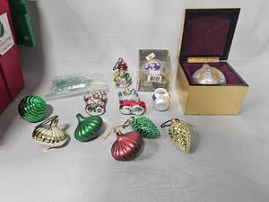 lot 99 image: VTG Glass and Plastic Christmas Ornaments - tote included, 1999 Glass Ornament in Gold Box and MN Vikings Ornament