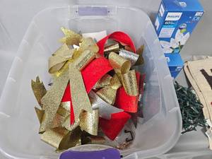 lot 101 image: 4 Sets of Christmas Lights (untested), 5 Holiday Themed Indoor Rugs and Variety of Large Holiday Bows