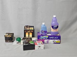 lot 137 image: Various Light Bulbs inc Green and Halloween Bulbs, Swiffer Pads and Swiffer Wet Jet Solution