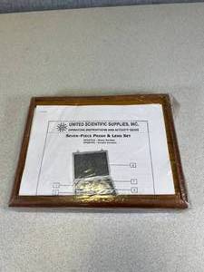 lot 20 image: United Scientific Supplies Inc Seven Piece Prism & Lens SET