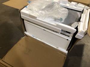 lot 7 image: LG 9,800 BTU 230V Through-the-Wall Air Conditioner LT1036CER Cools 450 Sq. Ft. with remote in White   Customer Returns See Pictures