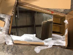 lot 9 image: Home Decorators Collection Kordite 42 in. W x 7 in. D x 24 in. H Rectangular Surface Mount Almond Latte Medicine Cabinet with Mirror   Customer Returns See Pictures