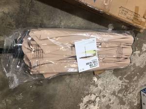 lot 39 image: Beige Patio Umbrella  Customer Returns See Pictures