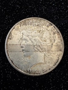 lot 28 image: 1925 Silver Peace Dollar
