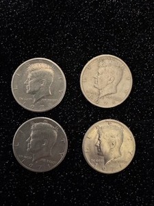 lot 59 image: Lot of 1973 Kennedy Half Dollars