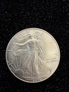 lot 102 image: 2002 American Silver Eagle