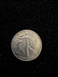 lot 147 image: 1945 Walking Liberty Half Dollar