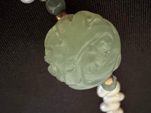 lot 329 image: Lovely Fresh Water Pearl and Carved Pendant Necklace