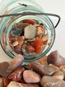 lot 318 image: Vintage Blue Ball Canning Jar filled with Variety of Polished Agates