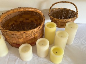 lot 316 image: Two Decorative Woven Baskets and a Variety of Battery Operated Candles