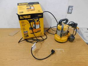 lot 31 image: DEWALT 13 hp. Stainless SteelCast Iron Submersible Sump Pump