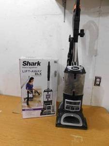 lot 52 image: Shark Navigator Lift-Away DLX Bagless Corded HEPA filter Upright Vacuum for Multi-Surface and Pet Hair in Black