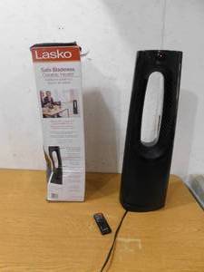 lot 54 image: Lasko Bladeless 1500W 28 in. Black Electric Oscillating Tower Ceramic Space Heater with Remote Control and Digital Display