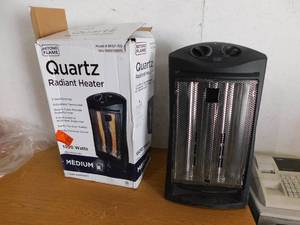 lot 85 image: 1500-Watt Black Electric Tower Quartz Infrared Space Heater with Thermostat