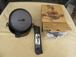 lot 58 image: Mixed Lot of John Wayne Cast Iron Pots and Camp Tripod