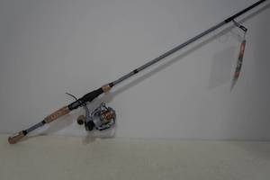 lot 84 image: Ozark Trail OTX 7 Spinning Rod & Reel Combo