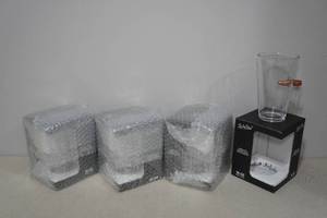lot 95 image: 4 Lucky Shot Pint Glasses with Embedded Bullets