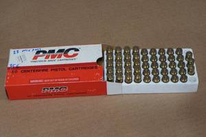 lot 115 image: 23 Assorted 10mm Auto Ammo - Plus 25 Empty Casings