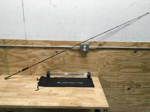 lot 39 image: Bass Pro Shops Micro Lite Graphite Spinning Rod Model # MCL66MS-4