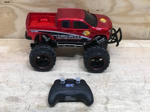 lot 56 image: Bass Pro Shops New Bright RC Chevrolet Silverado (Moves Forward And Back But Not Side To Side)