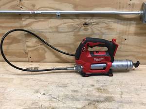 lot 64 image: Used Milwaukee M18 18V Lithium-Ion Cordless Grease Gun 2-Speed Model # 2646-20 (Tool-Only)