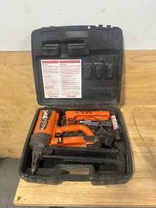 lot 94 image: RAMSET T3 Nail Gun with Charger, 2 Batteries and Case