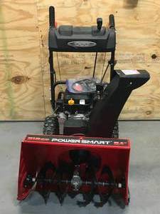 lot 20 image: Broken PowerSmart 24 in. 2-Stage Electric Start Gas Snow Blower with Heated Handles and LED Light Model # PSSHD24T (Missing Parts) (Sold As Is)