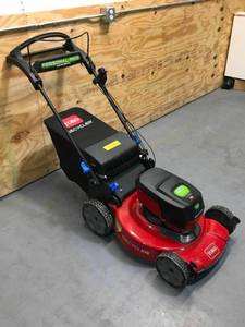 lot 1A image: Toro 60V Max 22 in. Recycler wPersonal Pace & SmartStow Lawn Mower Model # 21466 (Includes 6Ah Battery and charger)
