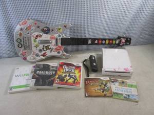 lot 302 image: (F-0) Wii Console, Controller, Guitar and Games - No Cords - Untested  As-Is