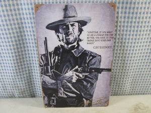 lot 19 image: (FS) Clint Eastwood Tin Sign 11 34 x 7 34