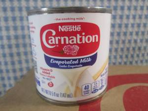 lot 94 image: (C-2) Case of 24 Cans Nestle Carnation Evaporated Milk Past Date