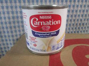 lot 95 image: (C-2) Case of 24 Cans Nestle Carnation Evaporated Milk Past Date