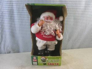 lot 146 image: (EC1) Animated Rock N Roll Santa...