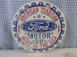 lot 323 image: (FS) Round Ford Motor Co. Tin Sign 11 12 - New In Wrap