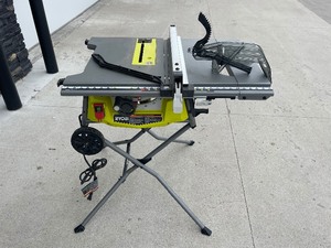 lot 16 image: Ryobi 10 Fold Up Table Saw