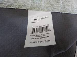 lot 93 image: 2 x 37 x 84 Mainstays Black Out Curtain Panels