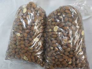 lot 203 image: 2 x 2 lb. Bags Whole Roasted Almonds