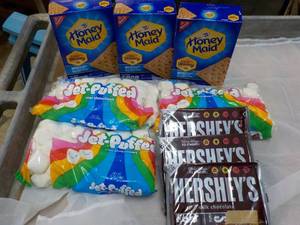 lot 37 image: Smores Kit - 3 each 14.4 oz Boxes Honey Maid Graham Crackers, 12 oz Bag Marshmallows and 3 x 6 packs Hersheys Full Size Candy Bars