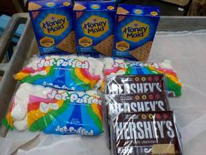 lot 38 image: Smores Kit - 3 each 14.4 oz Boxes Honey Maid Graham Crackers, 12 oz Bag Marshmallows and 3 x 6 packs Hersheys Full Size Candy Bars
