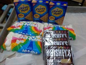 lot 39 image: Smores Kit - 3 each 14.4 oz Boxes Honey Maid Graham Crackers, 12 oz Bag Marshmallows and 3 x 6 packs Hersheys Full Size Candy Bars