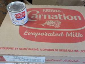 lot 59 image: 24 x 5 oz Cans Nestle Carnation Evaporated Milk - past best date