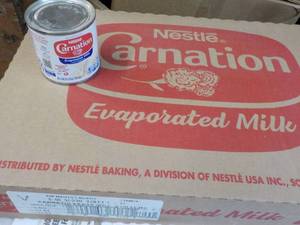 lot 60 image: 24 x 5 oz Cans Nestle Carnation Evaporated Milk - past best date