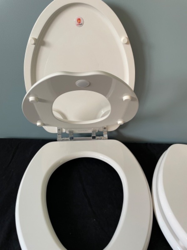 lot 278 image: Two Topseat Specialty Toilet Seats for Children Great for Toilet Training