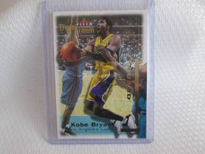 lot 115 image: 2000-01 Fleer Kobe Bryant Triple Cr...
